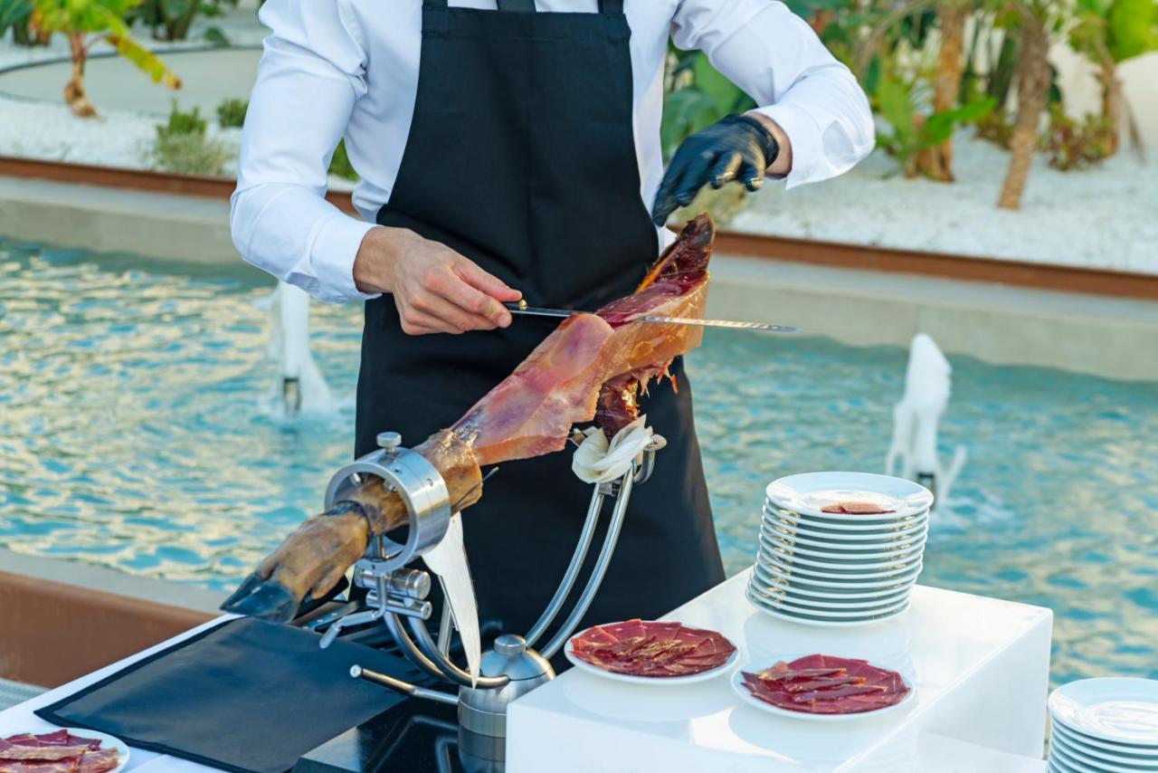 Cabogata Beach Hotel Retamar  Exterior photo Jamón being sliced